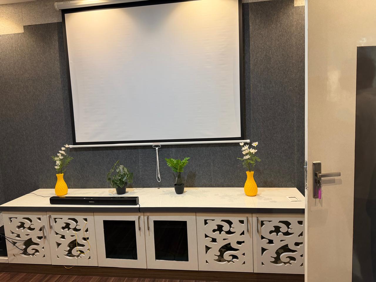 Projector screen and soundbar